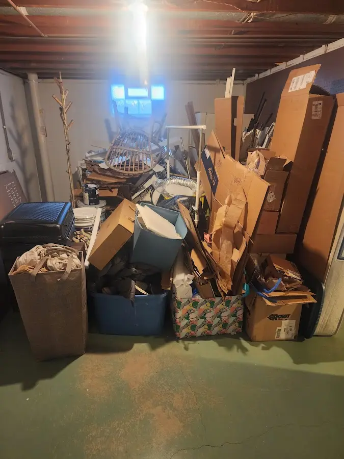 Roll-off dumpster container at job site for 6 Yard Dumpster Rental in Westport